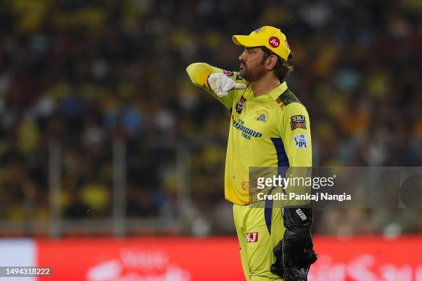 Dhoni of the Chennai Super Kings sets the field during the 2023 IPL Final match between Chennai Super Kings and Gujarat Titans at Narendra Modi...