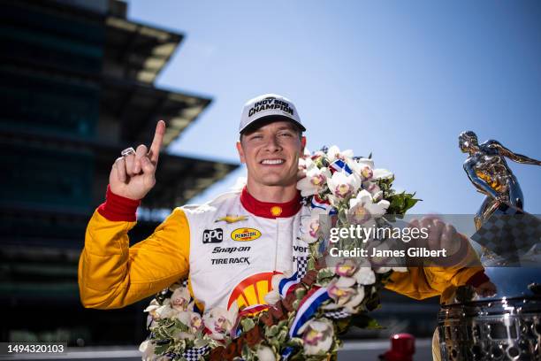 Josef Newgarden, driver of the PPG Team Penske Chevrolet, poses for a photo during the 107th Indianapolis 500 champion's portraits at Indianapolis...