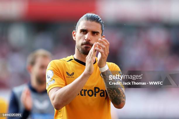 Ruben Neves of Wolverhampton Wanderers shows appreciation to the fans following defeat in the Premier League match between Arsenal FC and...