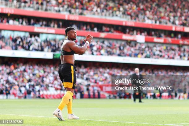 Adama Traore of Wolverhampton Wanderers shows appreciation to the fans following defeat in the Premier League match between Arsenal FC and...
