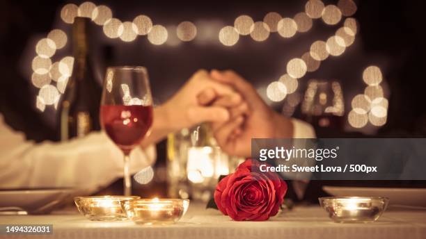 valentine day,rose,glass,fire,candle,flower,handshake - valentines day dinner foto e immagini stock