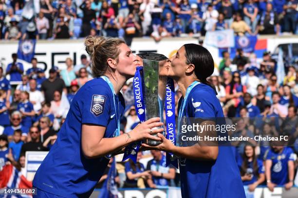 Millie Bright and Sam Kerr of Chelsea celebrate with the Barclays Women's Super League trophy following their team's victory in the FA Women's Super...