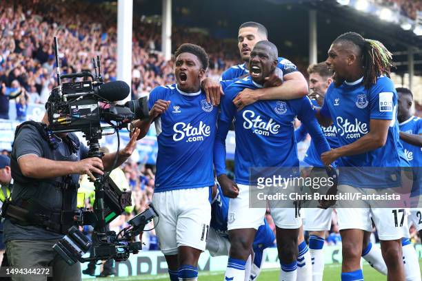 Abdoulaye Doucoure of Everton celebrates scoring the opening goal during the Premier League match between Everton FC and AFC Bournemouth at Goodison...