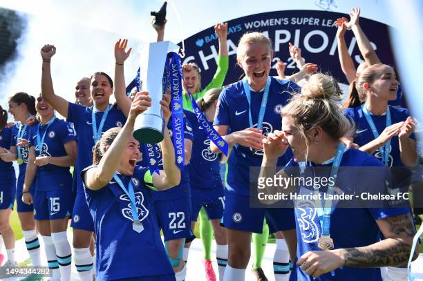 Magdalena Eriksson and Millie Bright of Chelsea celebrate with the Barclays Women's Super League trophy following their team's victory in the FA...