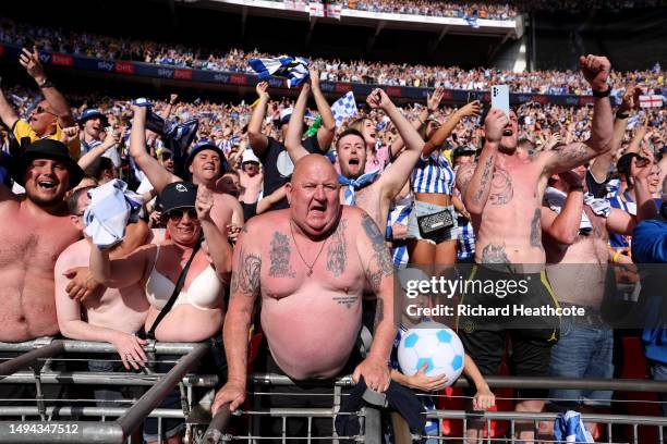 Sheffield Wednesday fans celebrate promotion at the final whistle during the Sky Bet League One Play-Off Final between Barnsley and Sheffield...