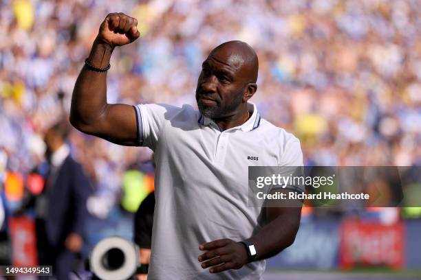 Darren Moore, Manager of Sheffield Wednesday, celebrates after the team's victory and promotion to the Sky Bet Championship in the Sky Bet League One...