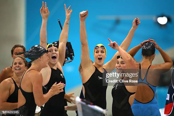 Emily Seebohm, Libby Trickett, Brittany Elmslie and Yolane Kukla celebrate after they finished first in heat two of the Women's 4x100m Freestyle...