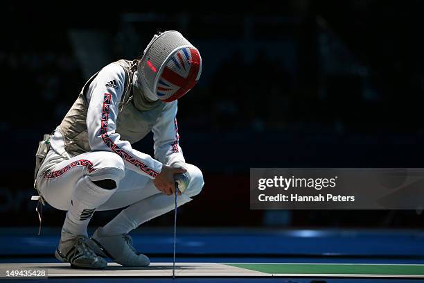 Anna Bentley of Great Britain looks on in her Women's Foil Individual Round of 64 match against Monica Peterson of Canada on day one of the London...