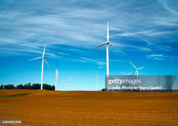 wind turbines in a field - whitby ontario canada stock pictures, royalty-free photos & images