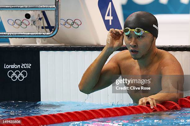 Kosuke Kitajima of Japan looks on after he competed in heat six of the Men's 100m Breaststroke on Day One of the London 2012 Olympic Games at the...