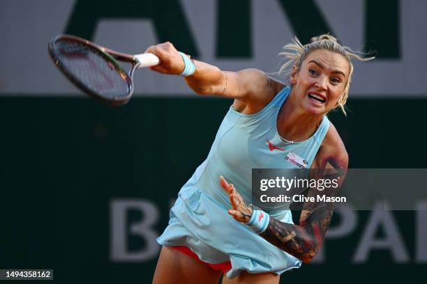 Tereza Martincova of Czech Republic serves against Jelena Ostapenko of Latvia during their Women's Singles First Round Match on Day Two of the 2023...