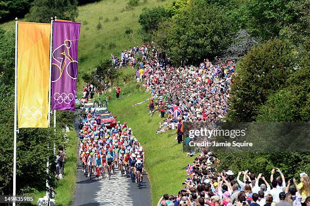 The peloton make their way up Box Hill during the Men's Road Race Road Cycling on day 1 of the London 2012 Olympic Games on July 28, 2012 in London,...