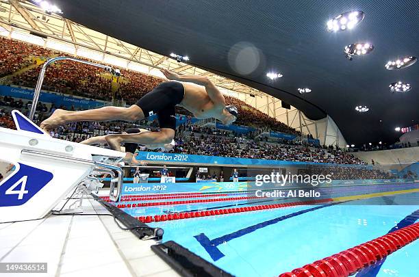 Kosuke Kitajima of Japan dives off of the starting block at the start of heat six of the Men's 100m Breaststroke on Day One of the London 2012...