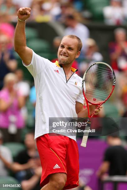 Steve Darcis of Belgium reacts after beating Tomas Berdych of Czech Republic in their Men's Singles Tennis match on Day 1 of the London 2012 Olympic...