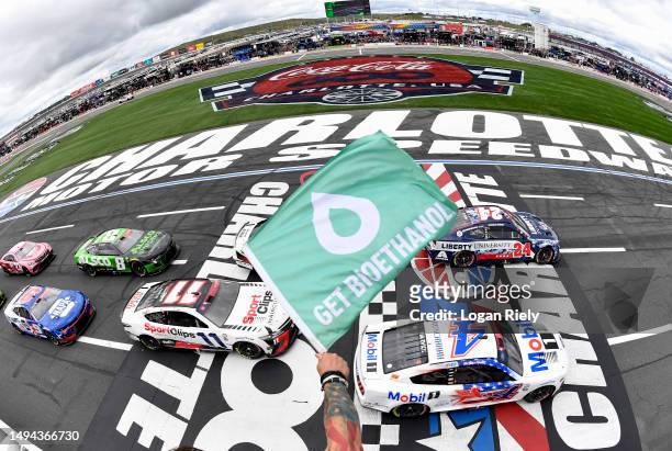 William Byron, driver of the Liberty University Patriotic Chevrolet, leads the field to the green flag to start the NASCAR Cup Series Coca-Cola 600...