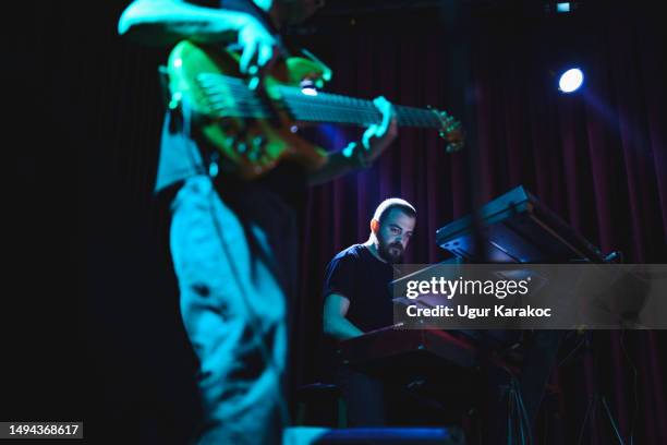 musicians on stage - concert hall stock pictures, royalty-free photos & images