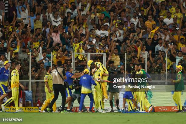 Dhoni and Ravindra Jadeja of the Chennai Super Kings celebrate after winning the 2023 IPL Final match between Chennai Super Kings and Gujarat Titans...