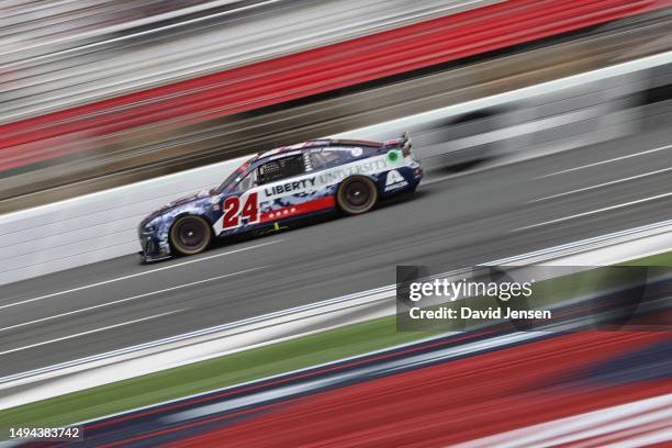 William Byron, driver of the Liberty University Patriotic Chevrolet, drives during the NASCAR Cup Series Coca-Cola 600 at Charlotte Motor Speedway on...