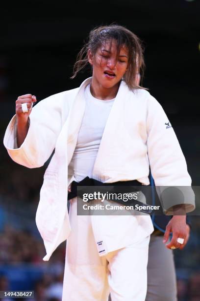 Sarah Menezes of Brazil celebrates her win over Cedric Mandembo Kebika of Democratic Republic of the Congo in the Women's -48 kg Judo on Day 1 of the...