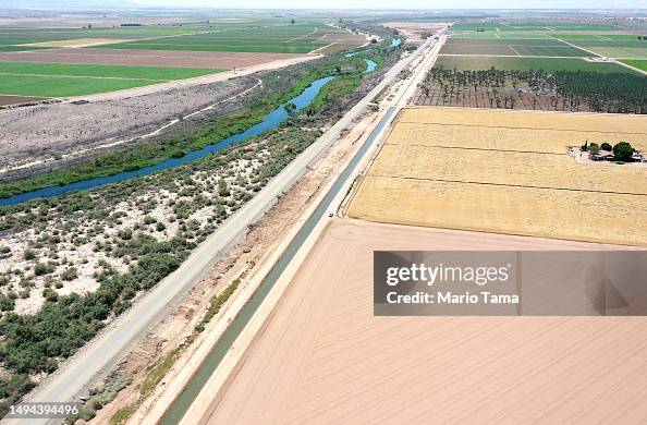 Fallowed An aerial view shows a voluntarily fallowed field amid farmland along ...
