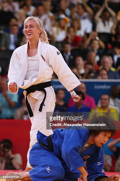 Eva Csernoviczki of Hungary celebrates defeating Tomoko Fukumi of Japan in the Women's -48 kg Judo bronze medal B match on Day 1 of the London 2012...