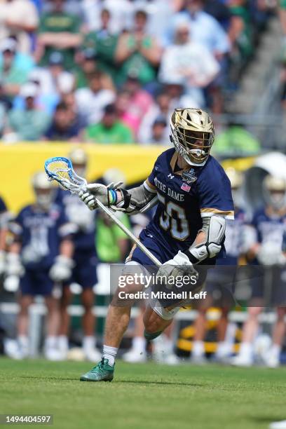 Chris Kavanagh of the Notre Dame Fighting Irish controls the ball against the Duke Blue Devils during the NCAA Division I Mens Lacrosse Championship...