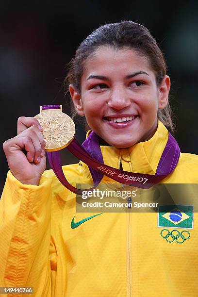 Sarah Menezes of Brazil celebrates winning the gold medal in the Women's -48 kg Judo on Day 1 of the London 2012 Olympic Games at ExCeL on July 28,...
