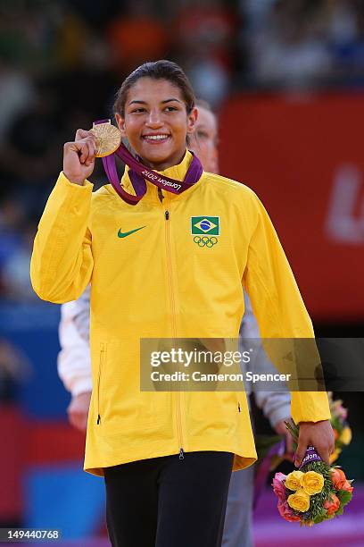 Sarah Menezes of Brazil celebrates winning the gold medal in the Women's -48 kg Judo on Day 1 of the London 2012 Olympic Games at ExCeL on July 28,...