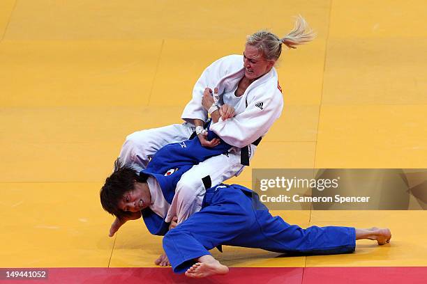 Eva Csernoviczki of Hungary defeats Tomoko Fukumi of Japan in the Women's -48 kg Judo bronze medal B match on Day 1 of the London 2012 Olympic Games...