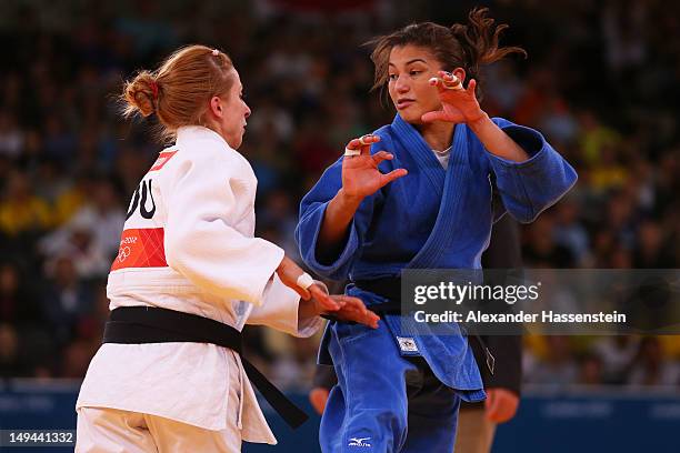 Sarah Menezes of Brazil competes against Alina Dumitru of Romania to win the gold medal in the Women's -48 kg Judo on Day 1 of the London 2012...