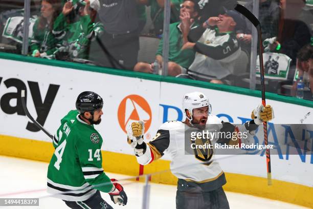William Carrier of the Vegas Golden Knights celebrates in front of Jamie Benn of the Dallas Stars after scoring a goal during the first period in...
