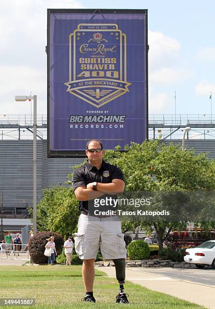 Troy Alabama Fire Lieutenant Curtiss Shaver, winner of Crown Royals Your Heros Name Here program, attends NASCAR at The Brickyard at the...