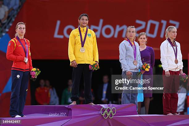 Alina Dumitru of Romania, Sarah Menezes of Brazil, Eva Csernoviczki of Hungary, and Charline Van Snick of Belgium, medalists in the Women's -48 kg...