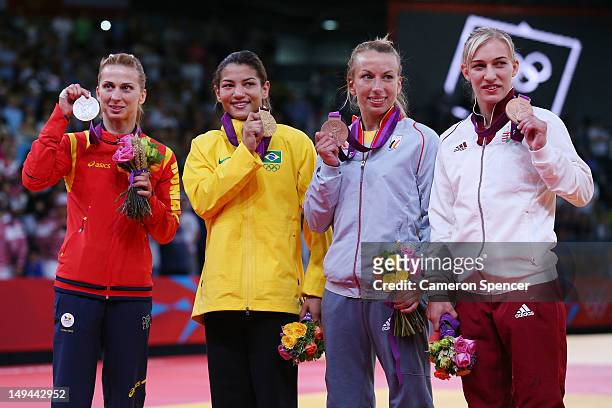 Alina Dumitru of Romania, Sarah Menezes of Brazil, Eva Csernoviczki of Hungary, and Charline Van Snick of Belgium, medalists in the Women's -48 kg...