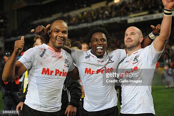 Pietersen, Lwazi Mvovo and Frederic Michalak of the Sharks celebrate victory in the Super Rugby semi final match between DHL Stormers and The Sharks...