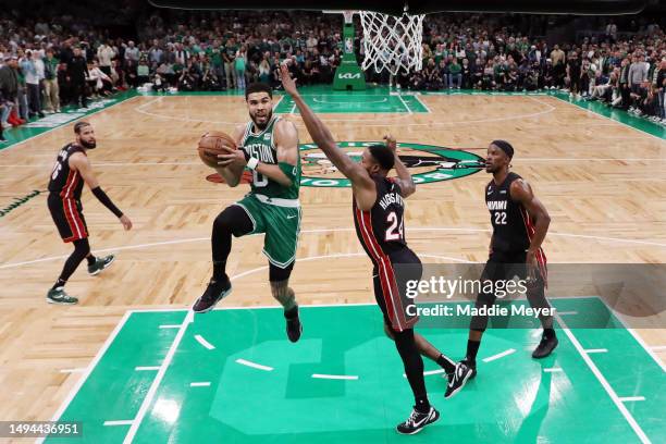 Jayson Tatum of the Boston Celtics drives to the basket against Haywood Highsmith of the Miami Heat during the second quarter in game seven of the...