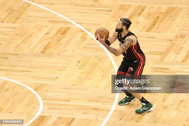 Caleb Martin of the Miami Heat attempts a three point basket during the fourth quarter against the Boston Celtics in game seven of the Eastern...