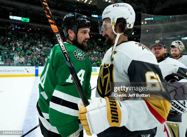 Mark Stone of the Vegas Golden Knights and Jamie Benn of the Dallas Stars talk after Game Six of the Western Conference Final of the 2023 Stanley Cup...