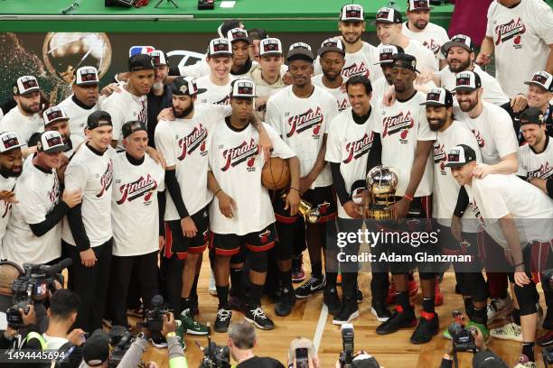 The Miami Heat pose with the Bob Cousy Trophy after defeating the Boston Celtics 103-84 in game seven of the Eastern Conference Finals at TD Garden...