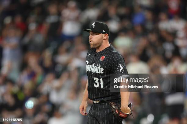 Liam Hendriks of the Chicago White Sox reacts before delivering a pitch during the eighth inning against the Los Angeles Angels at Guaranteed Rate...
