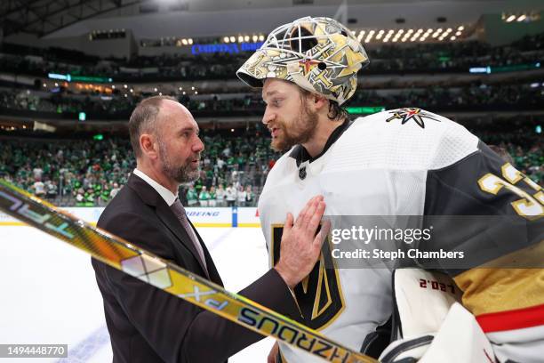 Adin Hill of the Vegas Golden Knights greets Dallas Stars coach Peter DeBoer after the Vegas Golden Knights beat the Dallas Stars 6-0 in Game Six of...