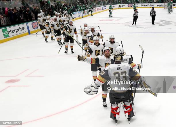The Vegas Golden Knights celebrate after beating the Dallas Stars 6-0 in Game Six of the Western Conference Final of the 2023 Stanley Cup Playoffs at...