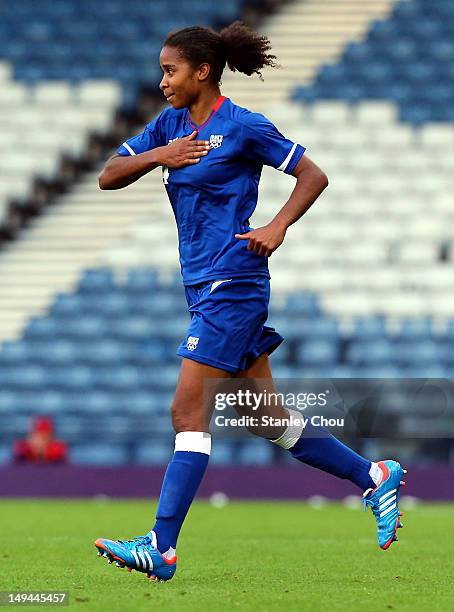 Laura Georges of France celebrates after scoring the opening goal during the Women's Football first round Group G match between France and DPR Korea...