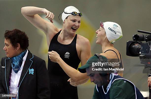 Cate Campbell and Alicia Coutts of Australia celebrate after winning the Final of the Women's 4x100m Freestyle Relay on Day One of the London 2012...