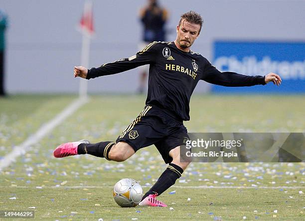 David Beckham of Los Angeles Galaxy kicks the ball during the MLS match against Chivas USA at The Home Depot Center on July 21, 2012 in Carson,...