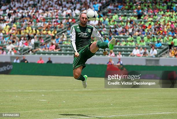Kris Boyd of the Portland Timbers jumps to play the ball on the attack during the MLS match against Chivas USA at The Home Depot Center on July 18,...