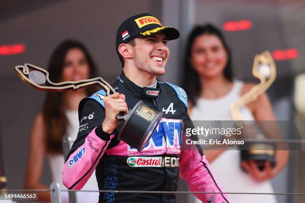Third placed Esteban Ocon of France and Alpine celebrates on the podium during the F1 Grand Prix of Monaco at Circuit de Monaco on May 28, 2023 in...