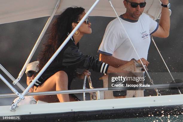 Rihanna is seen driving a boat on July 28, 2012 in Portofino, Italy.