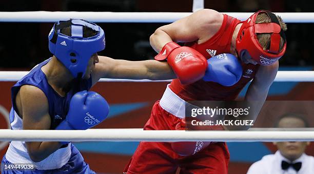 Jesse Ross of Australia is on the receiving end against Abdelmalek Rahou of Alergia during their first round Middleweight bout of the 2012 London...