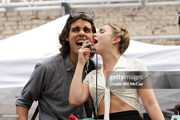 Michael Runion and Z Berg of the band JJAMZ perform at the Radio 104.5 Third Summer Block Party at The Piazza At Schmidt's July 28, 2012 in...